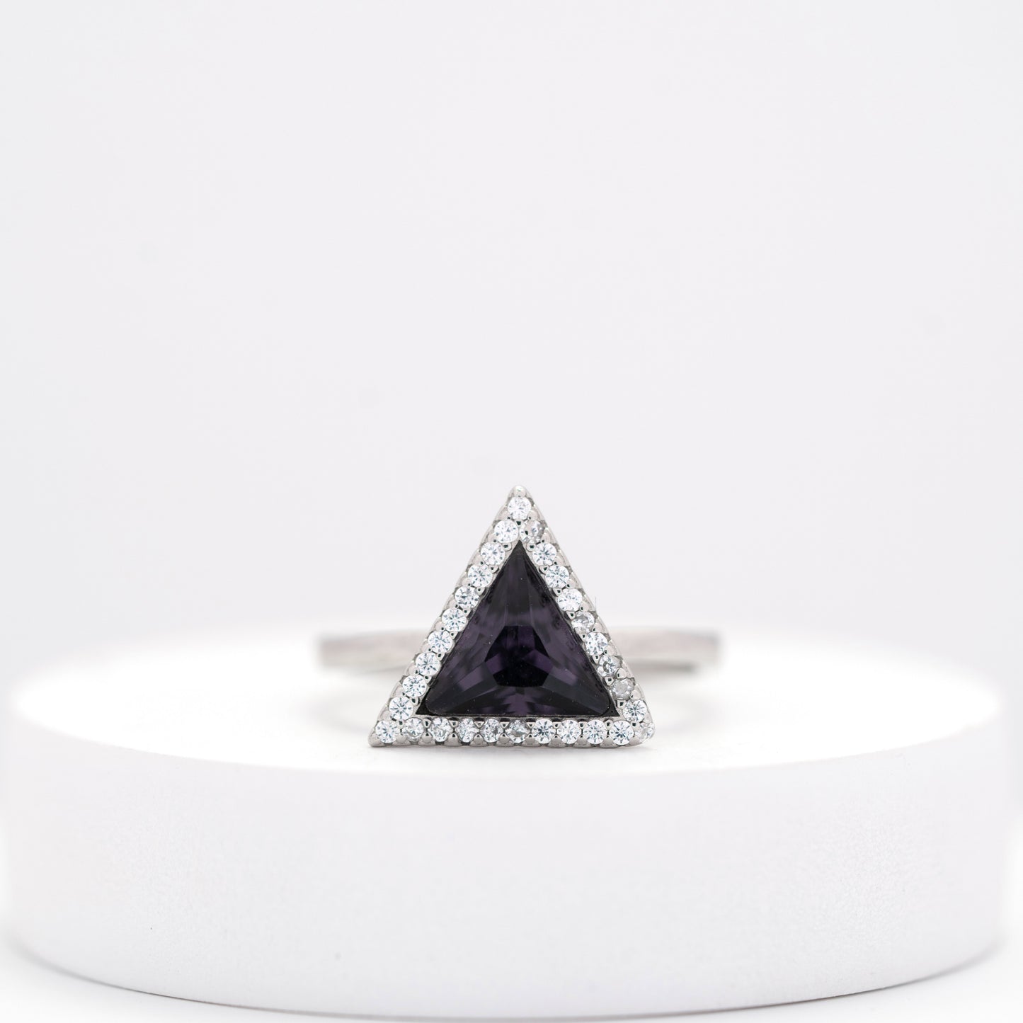 front view of handcrafted sterling silver ring with trillion cut amethyst – Violet Prism design