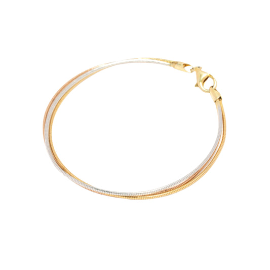 Gold hoop bracelet a white background