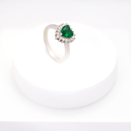 top view of elegant emerald heart cluster diamond ring 