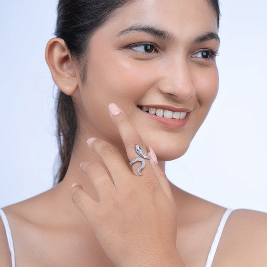 Silver snake ring on a model's hand