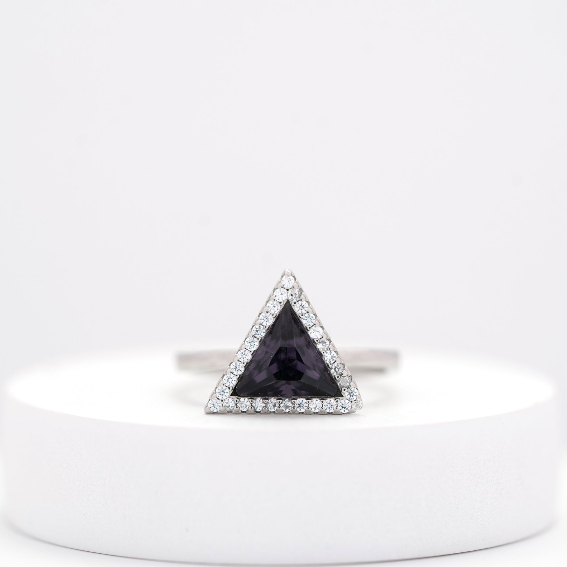 front view of handcrafted sterling silver ring with trillion cut amethyst – Violet Prism design